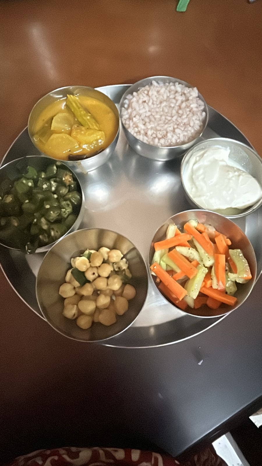 Balanced vegetarian meal: rice, mixed vegetables, dal and protein side